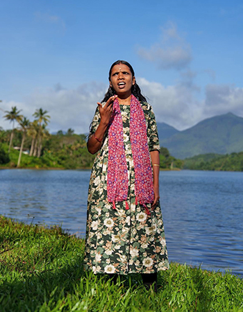 Band member Shyni M,. 35, from the Jenu Kuruba tribe, from Chembakamoola in Mananthavady is an ASHA worker. | Photo Credit: Courtesy ARPO Band member Shyni M,. 35, from the Jenu Kuruba tribe, from Chembakamoola in Mananthavady is an ASHA worker. | Photo Credit: Courtesy ARPO