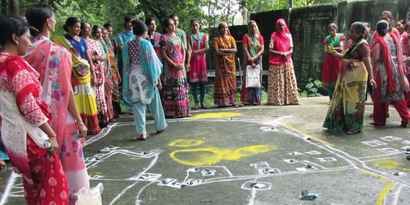 A group of women meet to discuss issues related to sanitation in their village