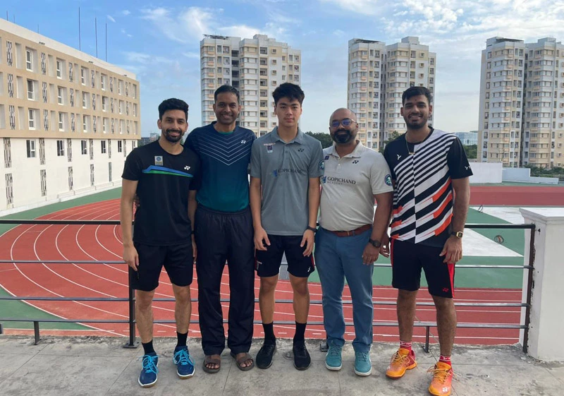 Thazuala with Coach Pullela Gopichand and MBI’s Sajith John after his gold at the 2025 Junior Nationals.
