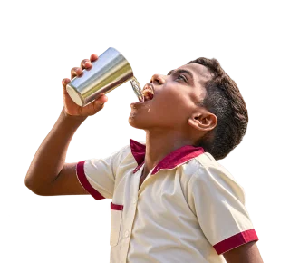 Child drinking water, representing systemic change and innovation