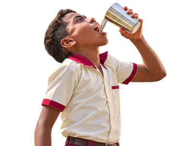 Child drinking water, representing systemic change and innovation