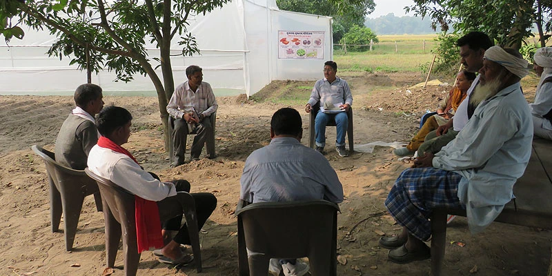 Field workers meet farmers in Vishambharpur village to share information about best practices that can enhance the latter’s crop productivity and earnings